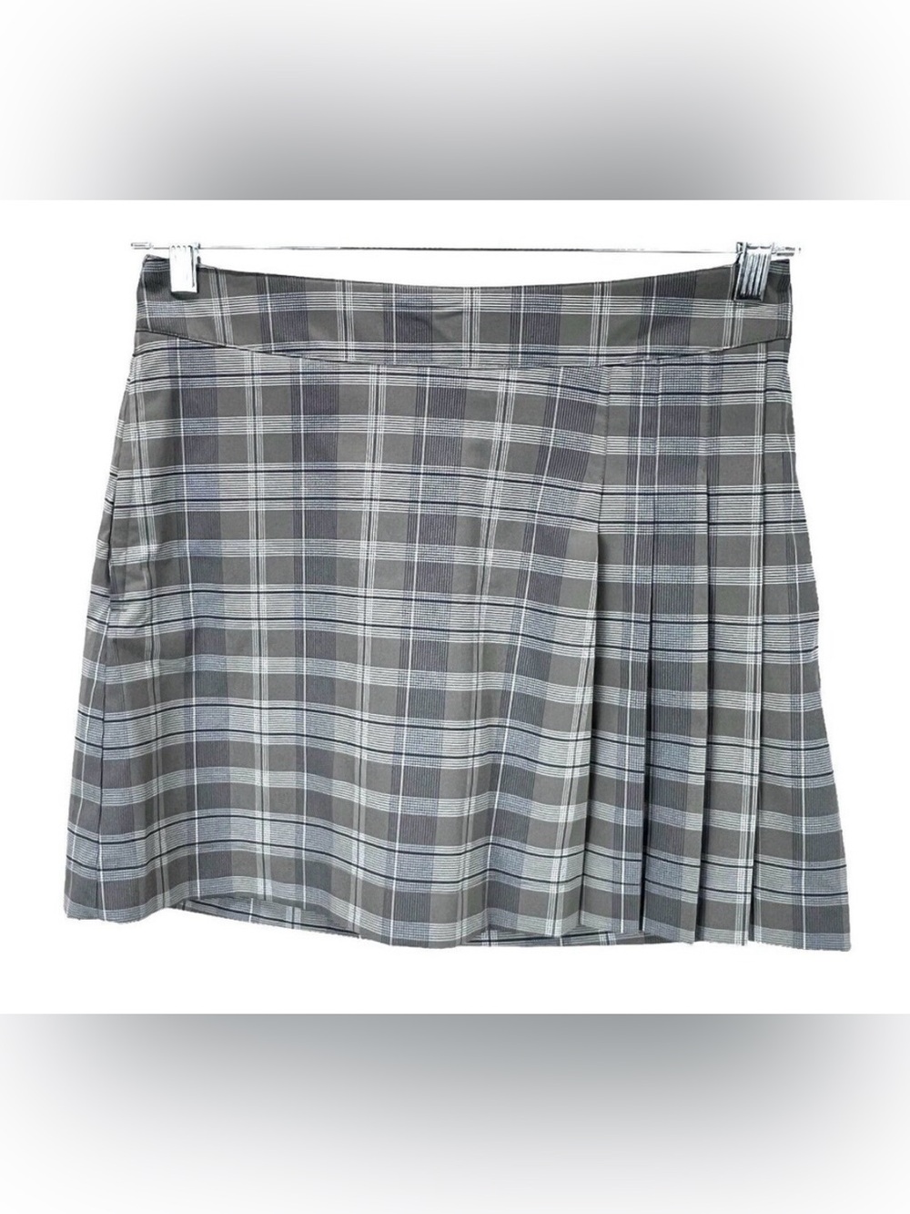 Nike neutral hues  Plaid Golf Skort. Dri fit fabric with pockets. Size 8